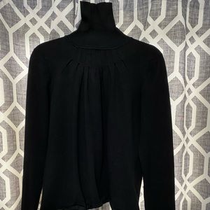 Black pleated front turtle neck